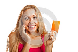 Young woman holding gift cards