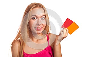 Young woman holding gift cards