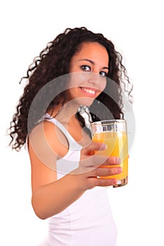 Young woman holding glass of orange juice isolated over white ba