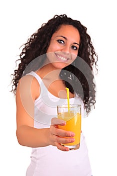 Young woman holding glass of orange juice over white ba