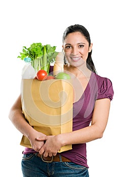 Young woman holding a grocery bag