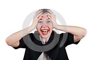 Young woman holding head and screaming happily