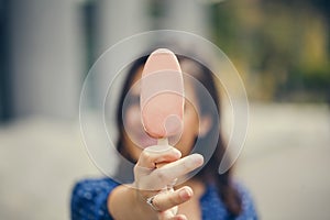 A Young Woman Holding Ice Cream