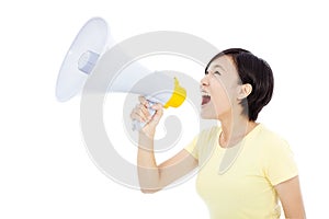 Young woman holding megaphone.isolated on white background