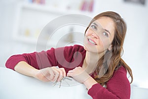 young woman holding out house keys