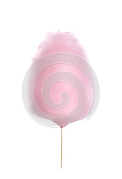 Young woman holding pink cotton candy on white background