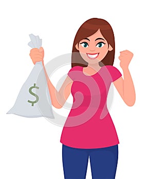 Young woman holding/showing cash, money, currency note bag with dollar sign and raised hand fist with happy winning or success.