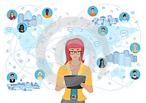 Young woman holding a tablet and communicating people all over the world. Social network and social media concept. photo