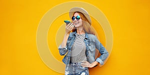 Young woman holding talking on the phone, using voice command recorder, assistant or takes calling