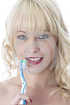 Young Woman Holding tooth Brush Brushing Teeth