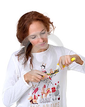 Young woman holding tooth brush and toothpaste