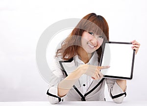 Young woman holding a touch pad