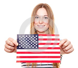 Young woman holding US flag