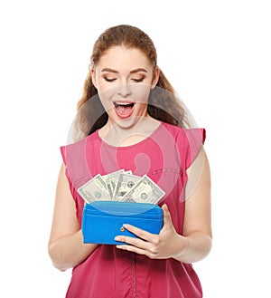 Young woman holding wallet with dollar banknotes on white background. Money savings concept