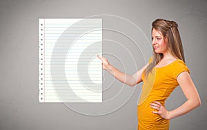 Young woman holding white paper copy space with diagonal lines