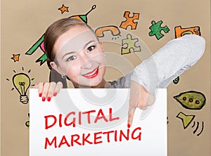 Young woman holding whiteboard with writing word: digital marketing. Technology, internet, business and marketing.