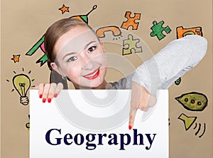 Young woman holding whiteboard with writing word: geography. Technology, internet, business and marketing.