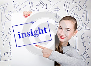 Young woman holding whiteboard with writing word: insight. Technology, internet, business and marketing.