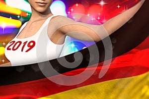 Young woman holds Germany flag in front on the party lights - Christmas and 2019 New Year flag concept 3d illustration