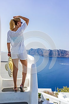 Young woman on holidays, Santorini Oia town