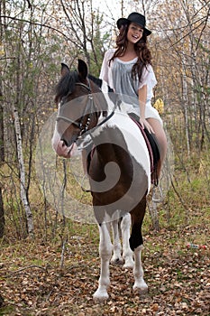 Young Woman And Horse