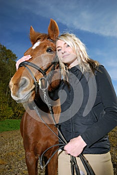 Young woman with horse