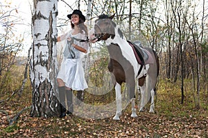 Young Woman And Horse