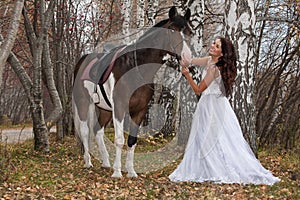 Young Woman And Horse