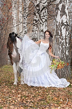 Young Woman And Horse