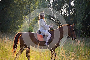 Young woman with horse