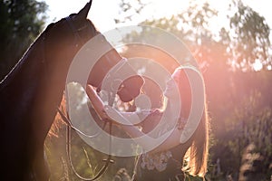 Young woman with horse