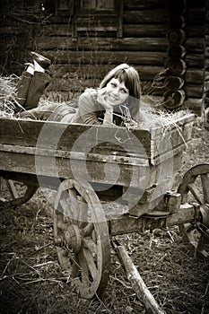 Young woman in horse cart