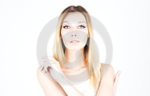 Young woman hugging herself. Permanent makeup. Arrows on the eyes.