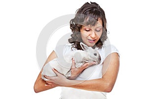 Young woman hugging rabbit