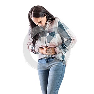 Young woman with IBS - irritable bowel syndrome holding her sore belly