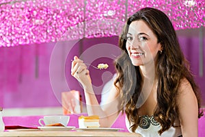 Young woman in ice cream parlor