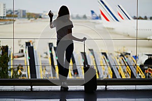 Young woman in international airport