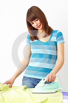 Young woman ironing