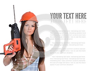 Young woman in jeans witch electric hammer drill