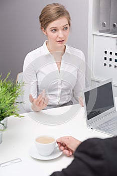 Young woman during job interview