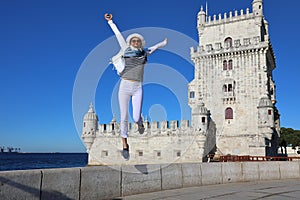 Young woman joyfully jumping