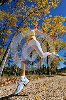 Young woman jumping