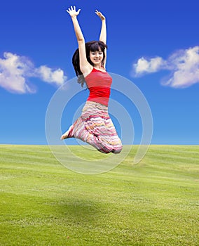 Young woman jumping