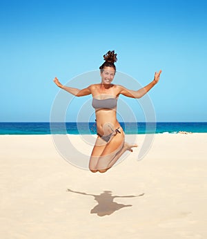 Young woman jumping