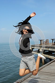 Young woman jumping outdoor