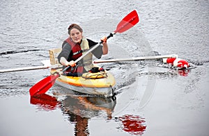 Young Woman Kayaking in Colder Weather