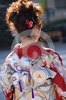 Young woman in kimono dress