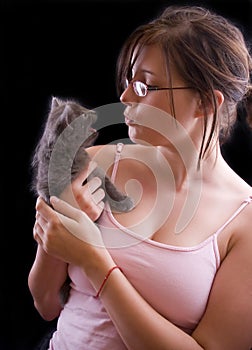 Young woman with kitten