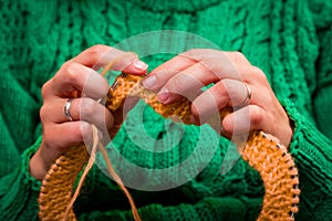 Young woman knitting