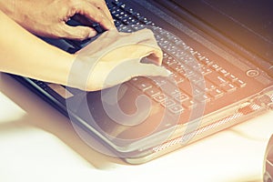 Young woman with laptop.